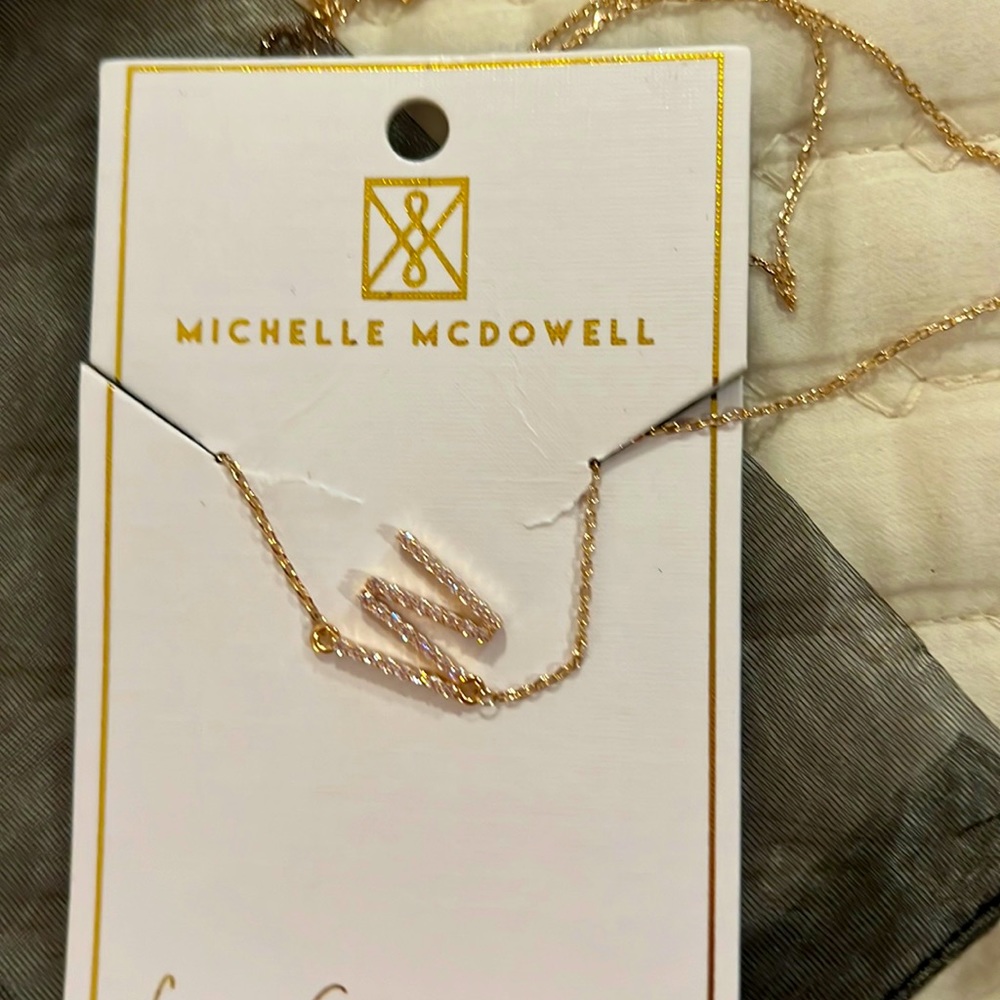 Michelle McDowell “W” boutique necklace.